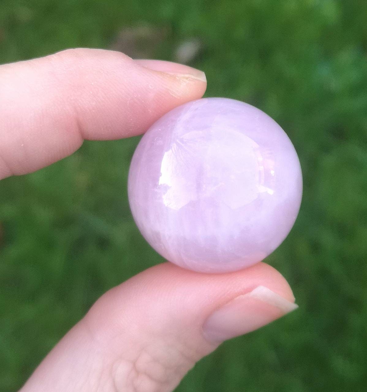 Premium Rose Quartz mini sphere.