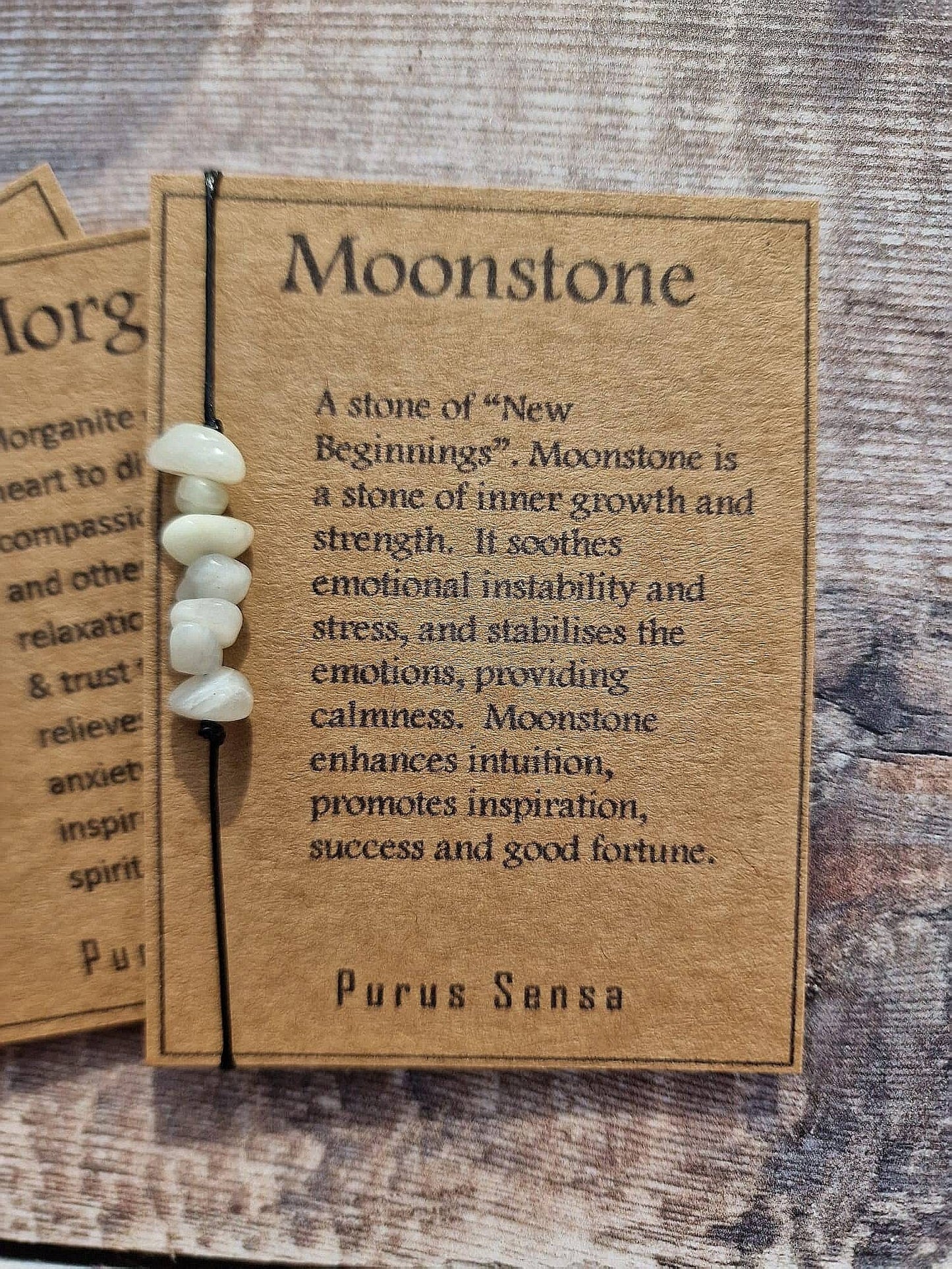 Minimalistic adjustable cord bracelet on Descriptive Card