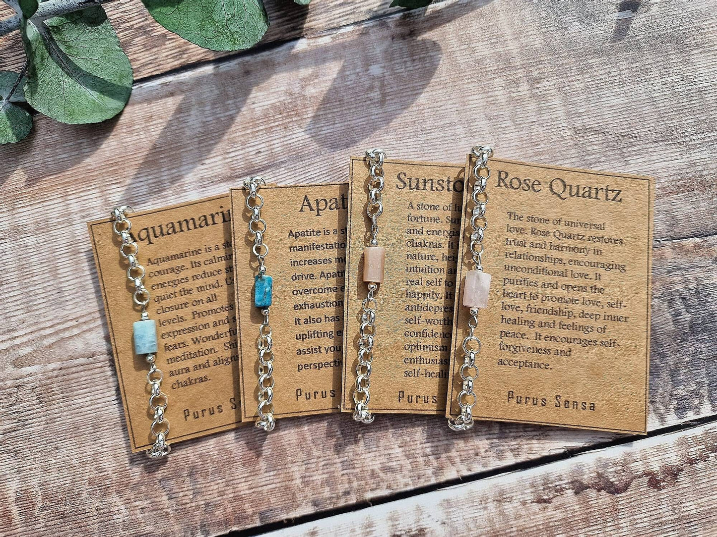 Apatite, aquamarine, Rose quartzor Sunstone chunky silver chain crystal bracelet on a descriptive Card.