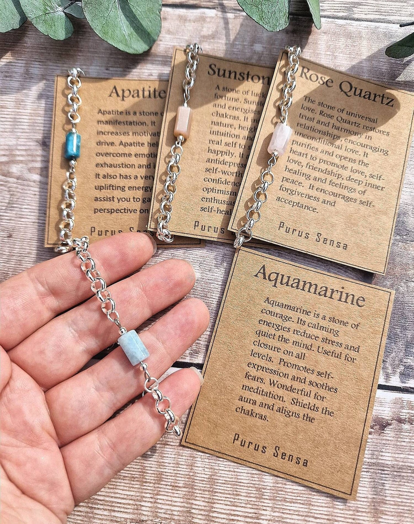 Apatite, aquamarine, Rose quartzor Sunstone chunky silver chain crystal bracelet on a descriptive Card.