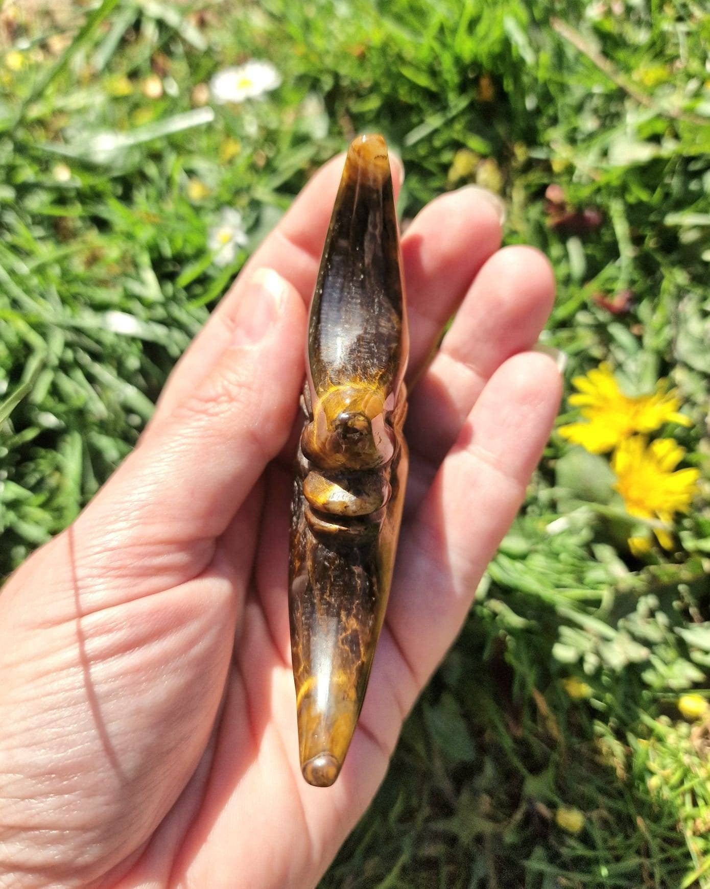 Large tiger eye half moon face carving