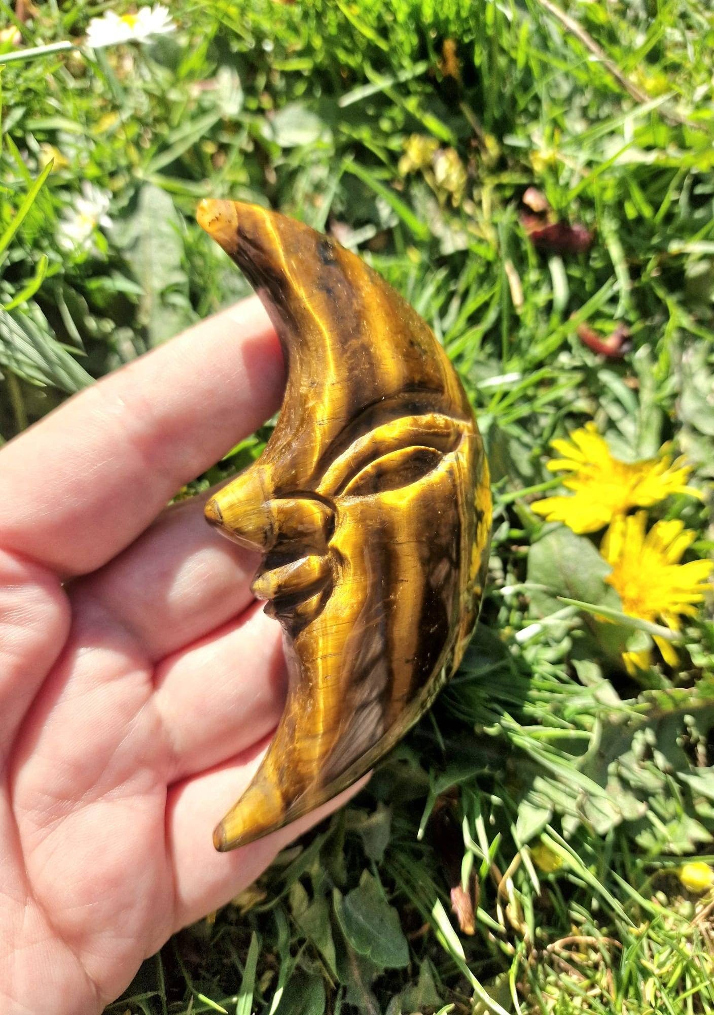 Large tiger eye half moon face carving