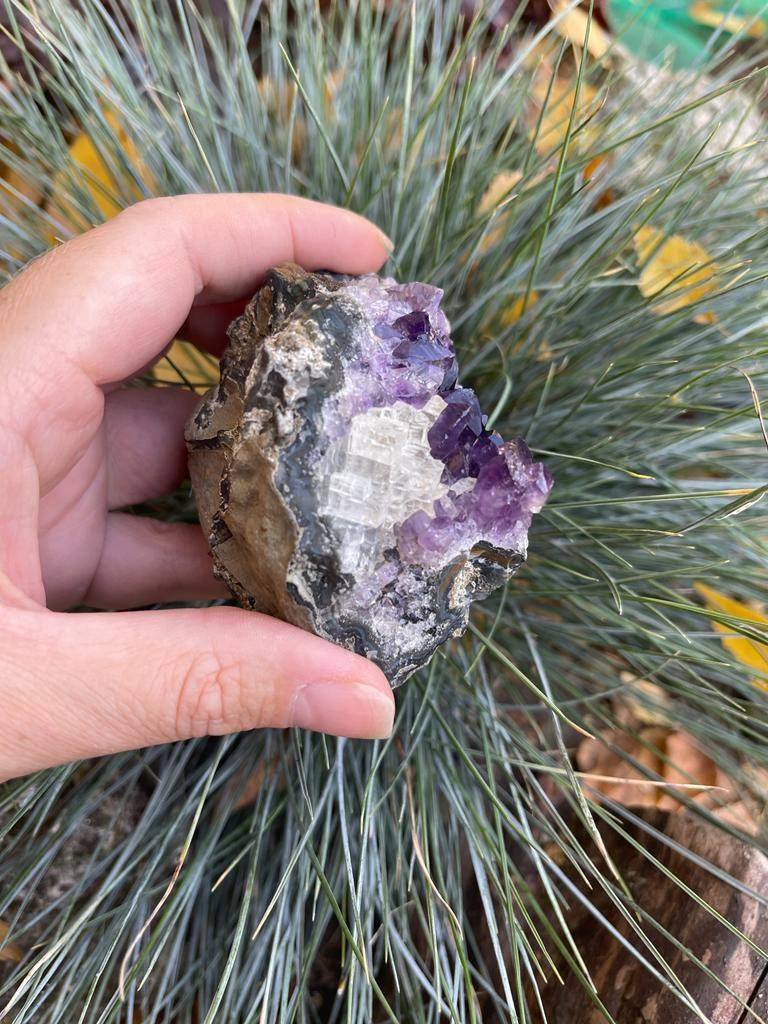 Beautiful Brazilian Amethyst geode with calcite. AAA grade