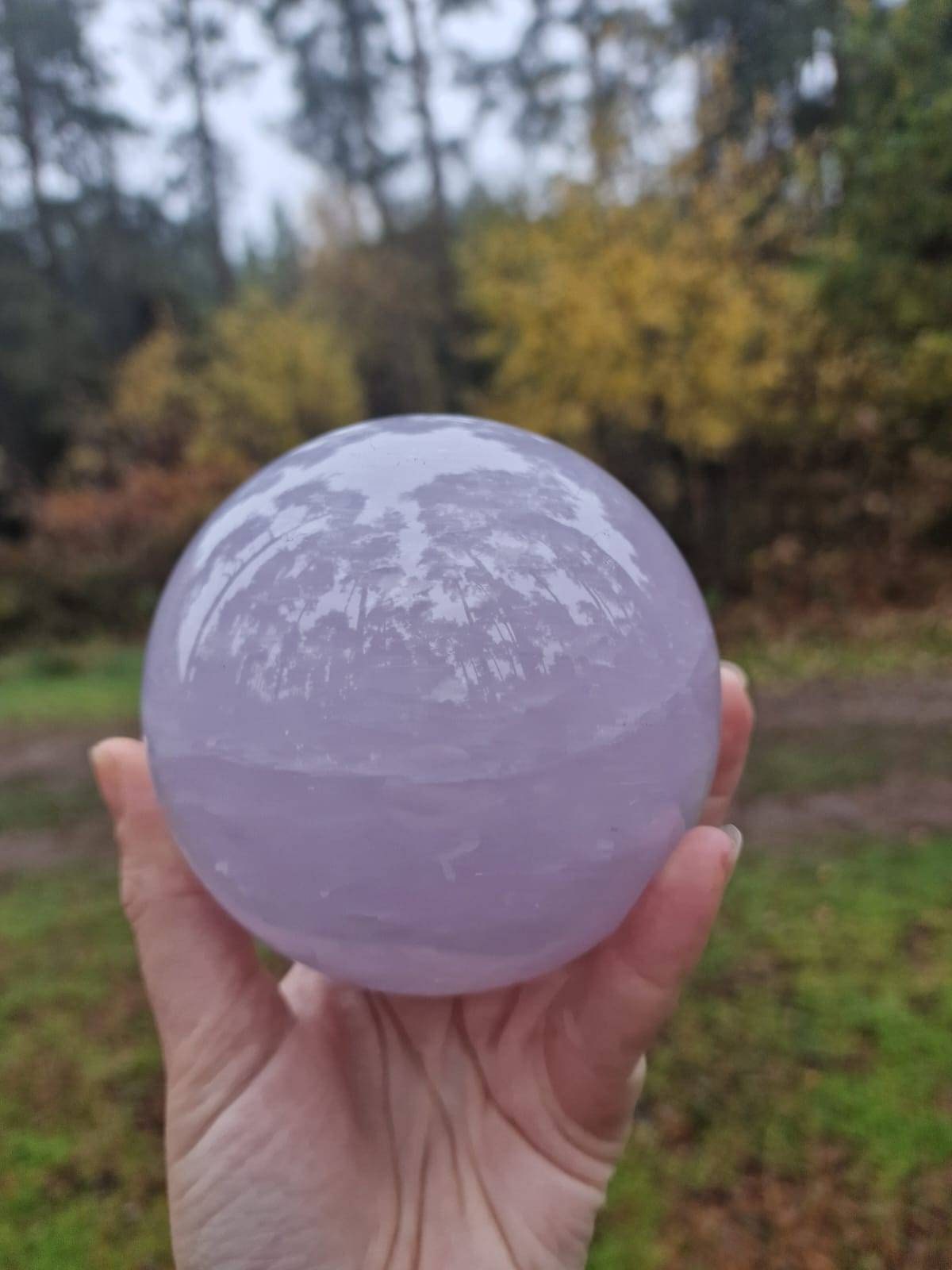 AAA grade Perfect, rare blue rose quartz sphere with a star flash. 1.3kg