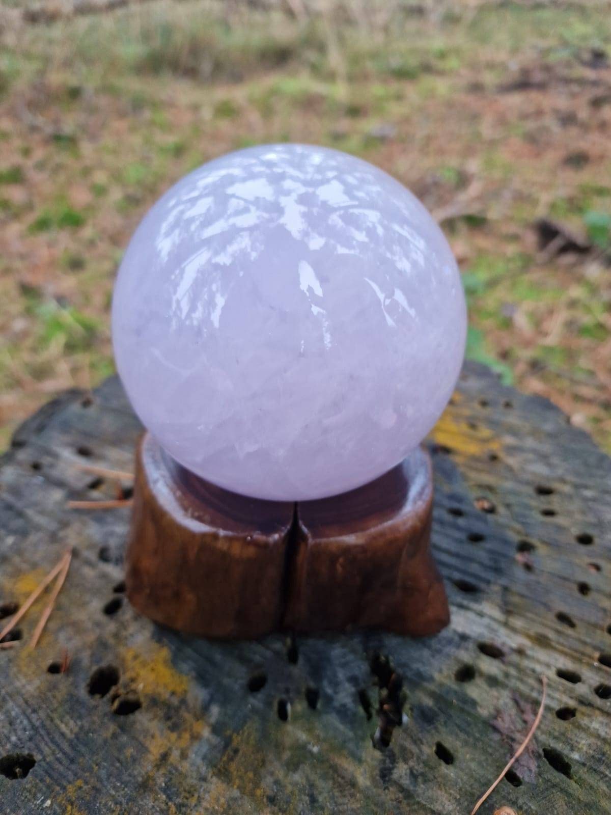 AAA grade Perfect, rare blue rose quartz sphere with a star flash. 1.3kg