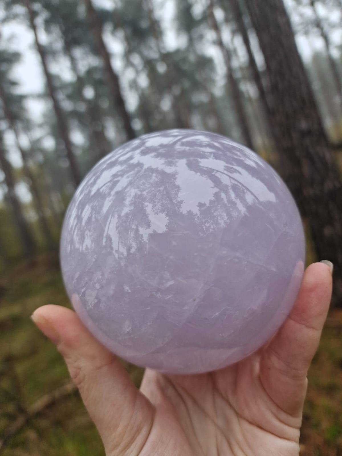 AAA grade Perfect, rare blue rose quartz sphere with a star flash. 1.3kg
