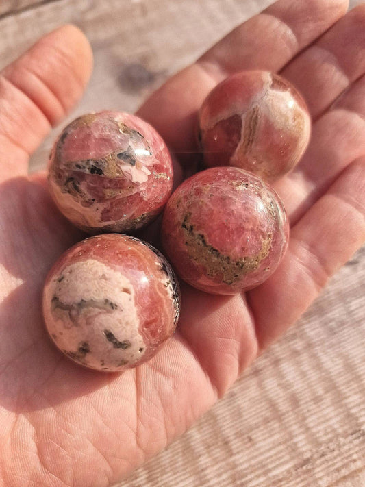 Premium quality rhodochrosite sphere