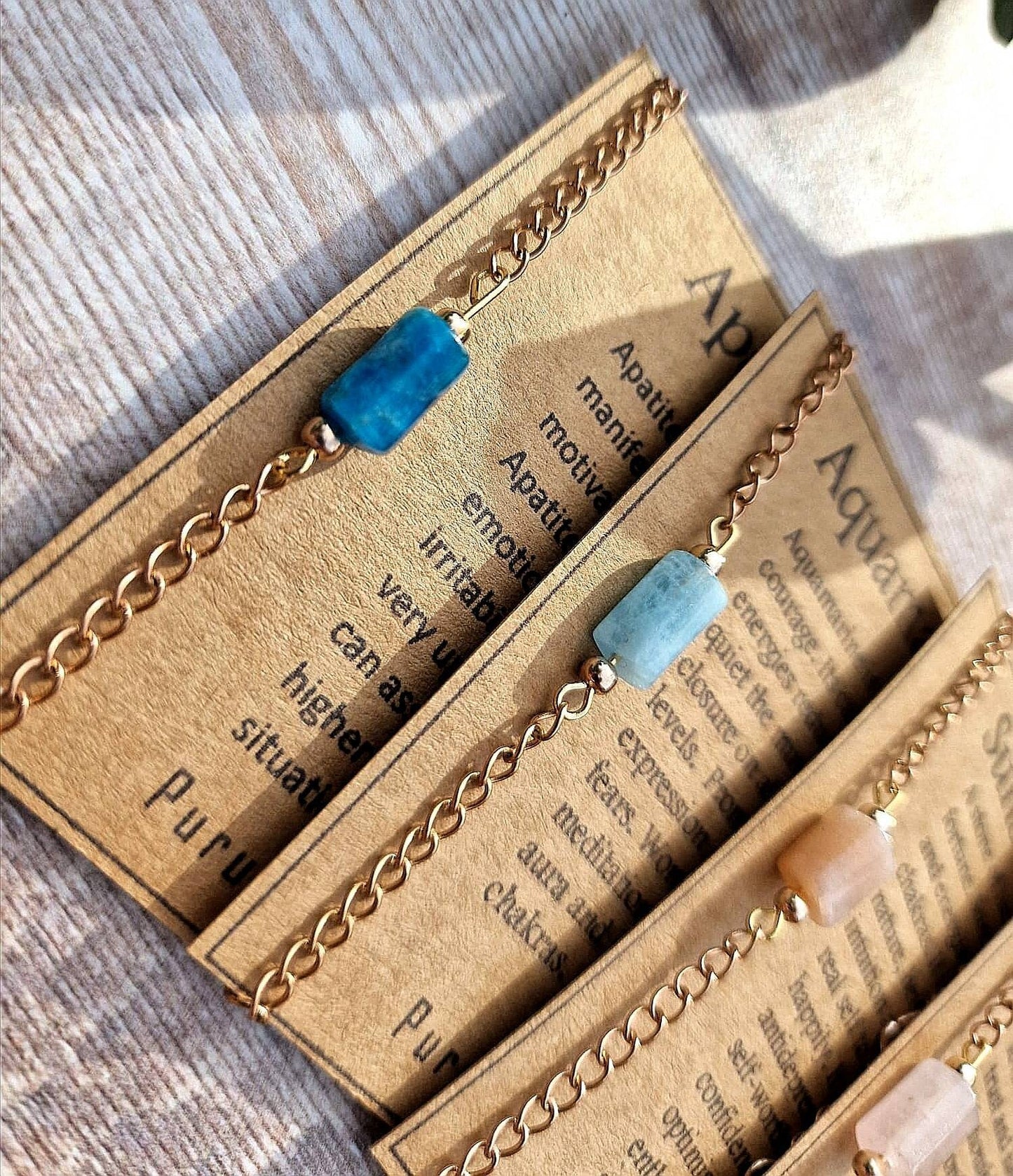 Apatite, Sunstone, rose quartz, aquamarine crystal bracelet with Rose gold or silver chain on Descriptive Card.