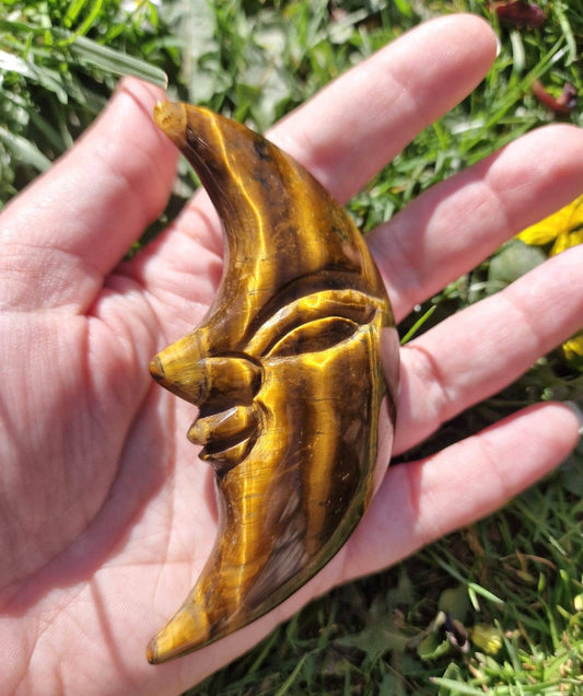 Large tiger eye half moon face carving