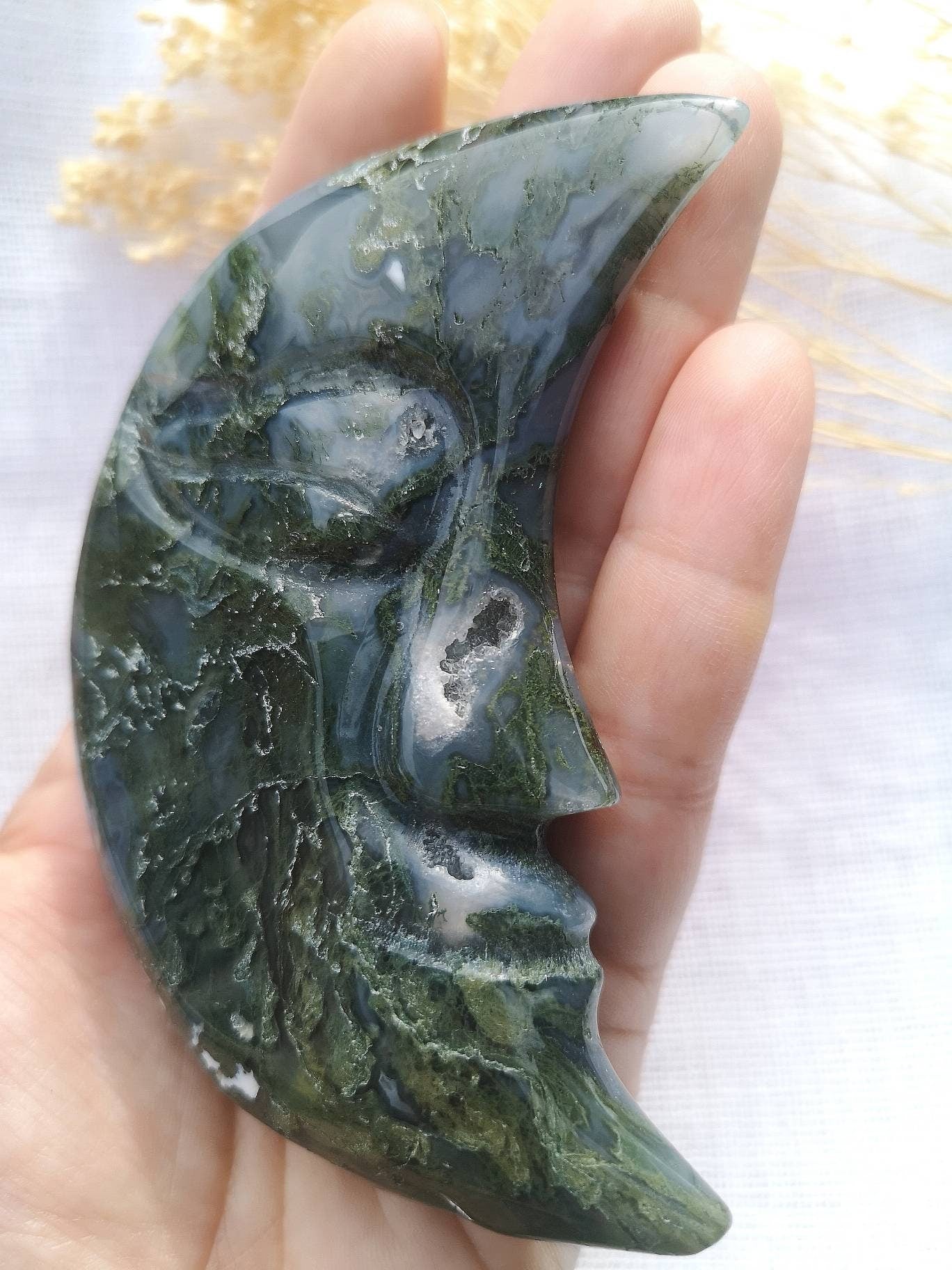 Large moss agate half moon face carving with druzy