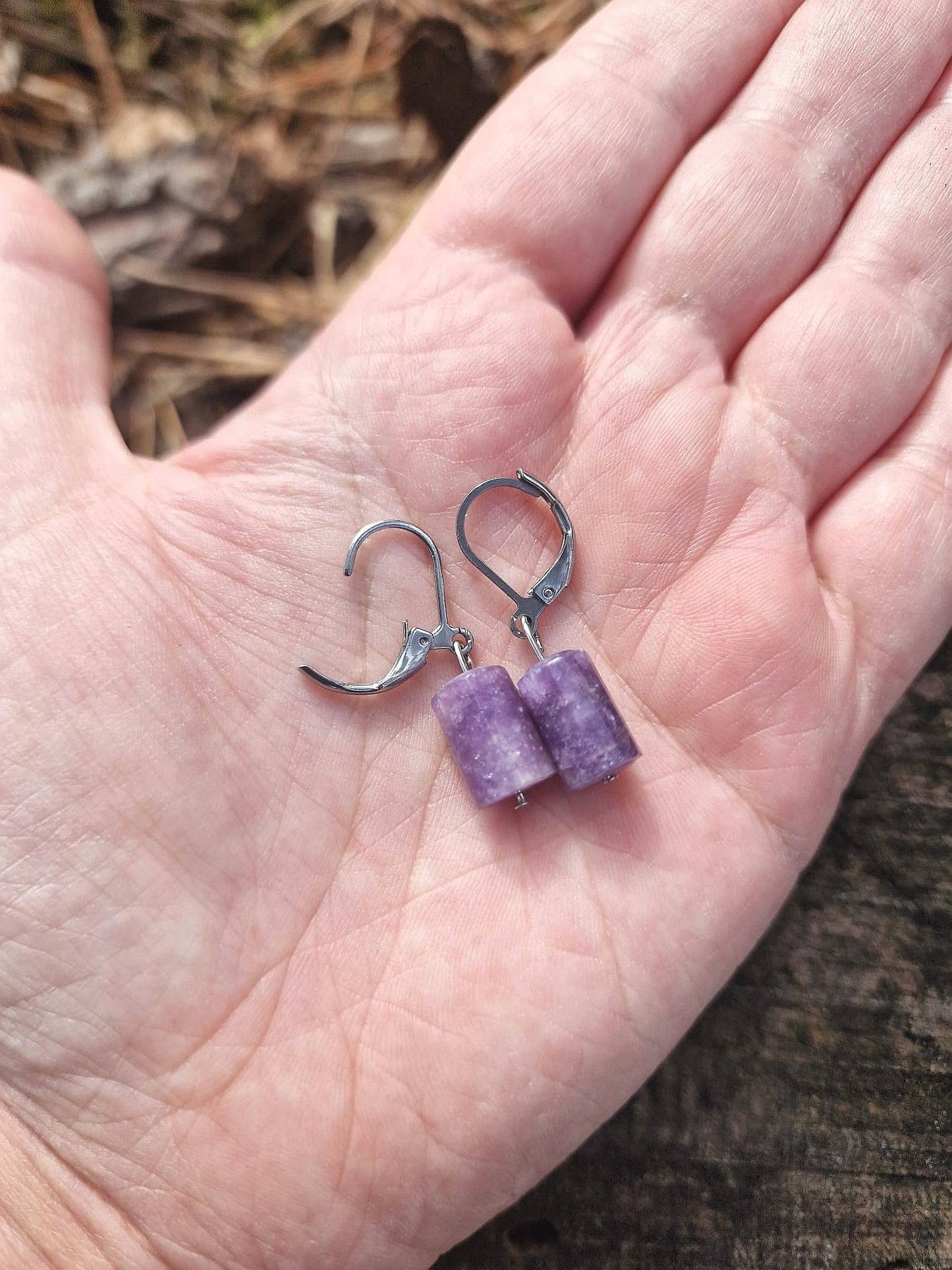 Beautiful Surgical steel Lepidolite huggie hoop earrings on a descriptive card