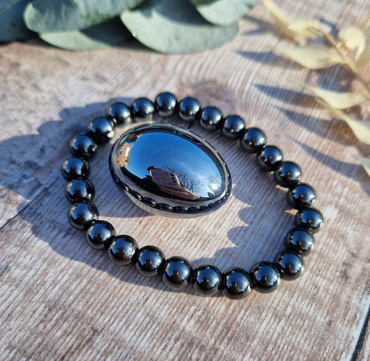 Genuine 8mm hematite bracelet and tumble stone set.