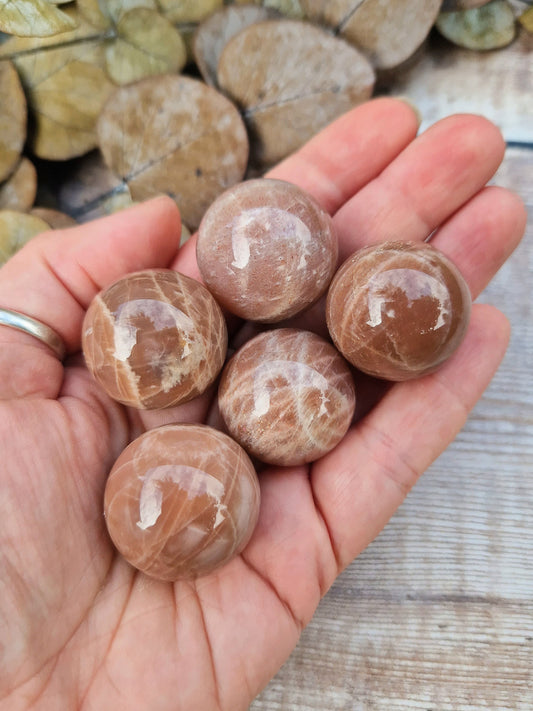 Beautiful golden sunstone tumble sphere